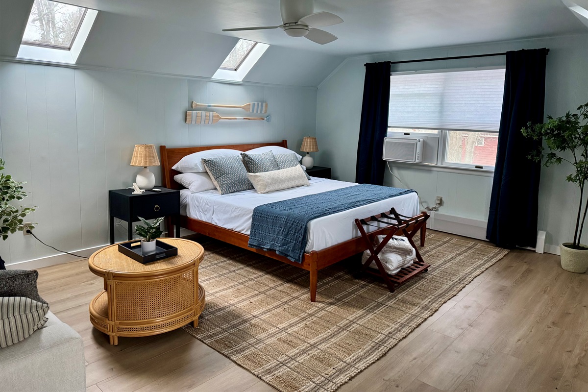 Guest bedroom — light, linens, and quiet luxury.