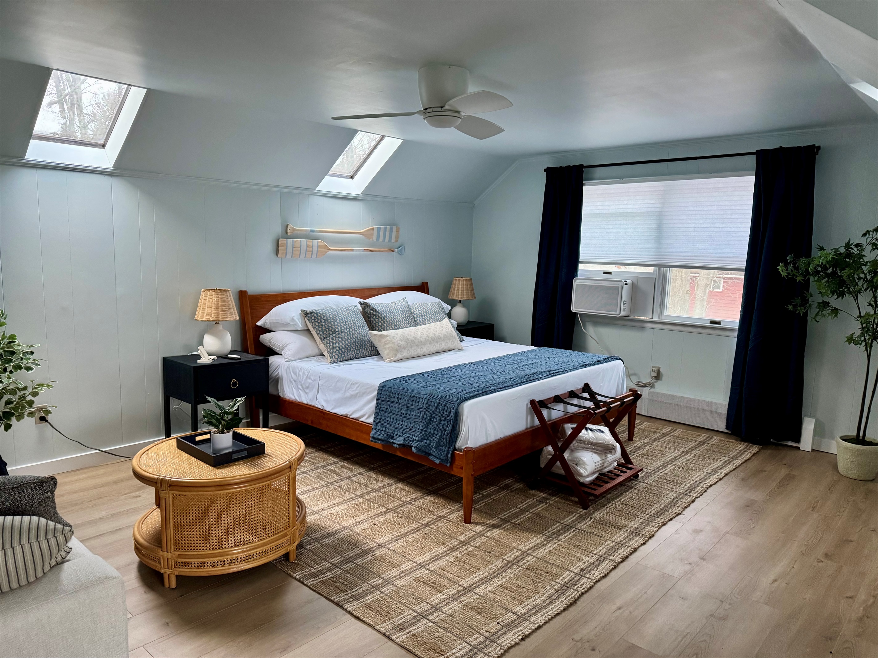 Guest bedroom — light, linens, and quiet luxury.