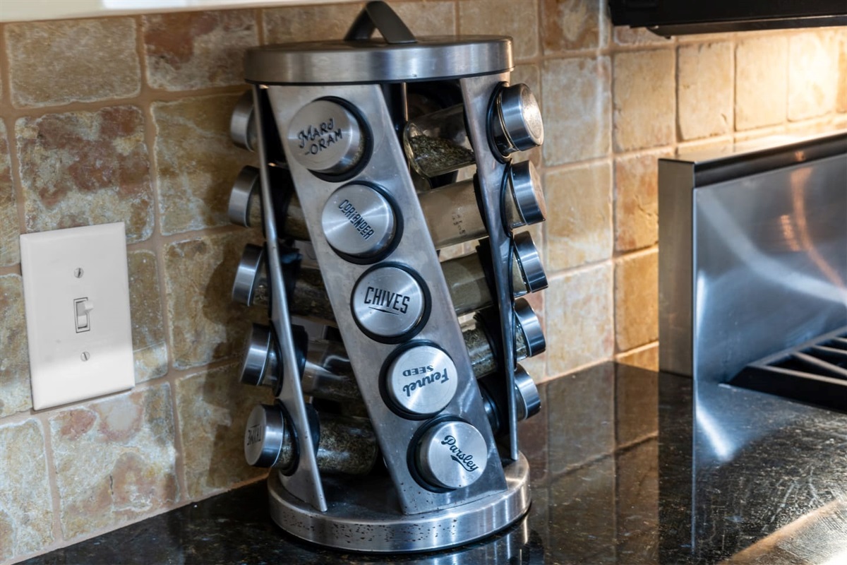 Fully stocked spice rack ready for your next home-cooked meal—perfect for guests who love to cook.