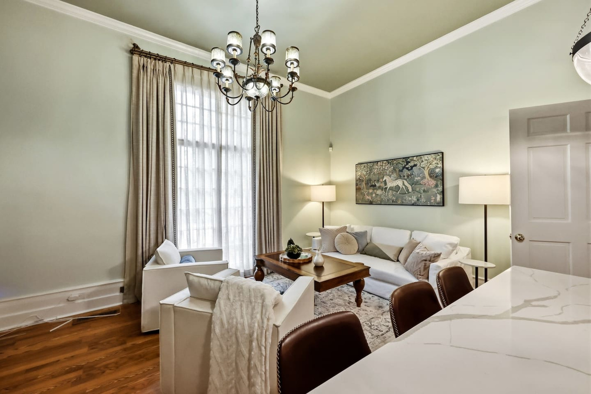 Comfortable living room with soaring 12-foot ceilings