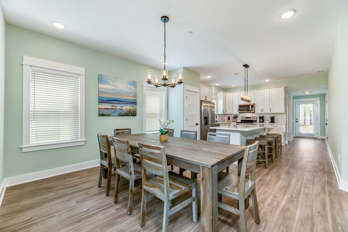 Gather comfortably around the large dining table just off the kitchen and living room.