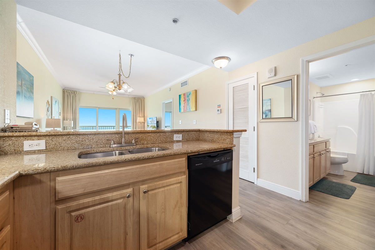 A well-equipped kitchen featuring modern appliances and stylish finishes, perfect for culinary enthusiasts.