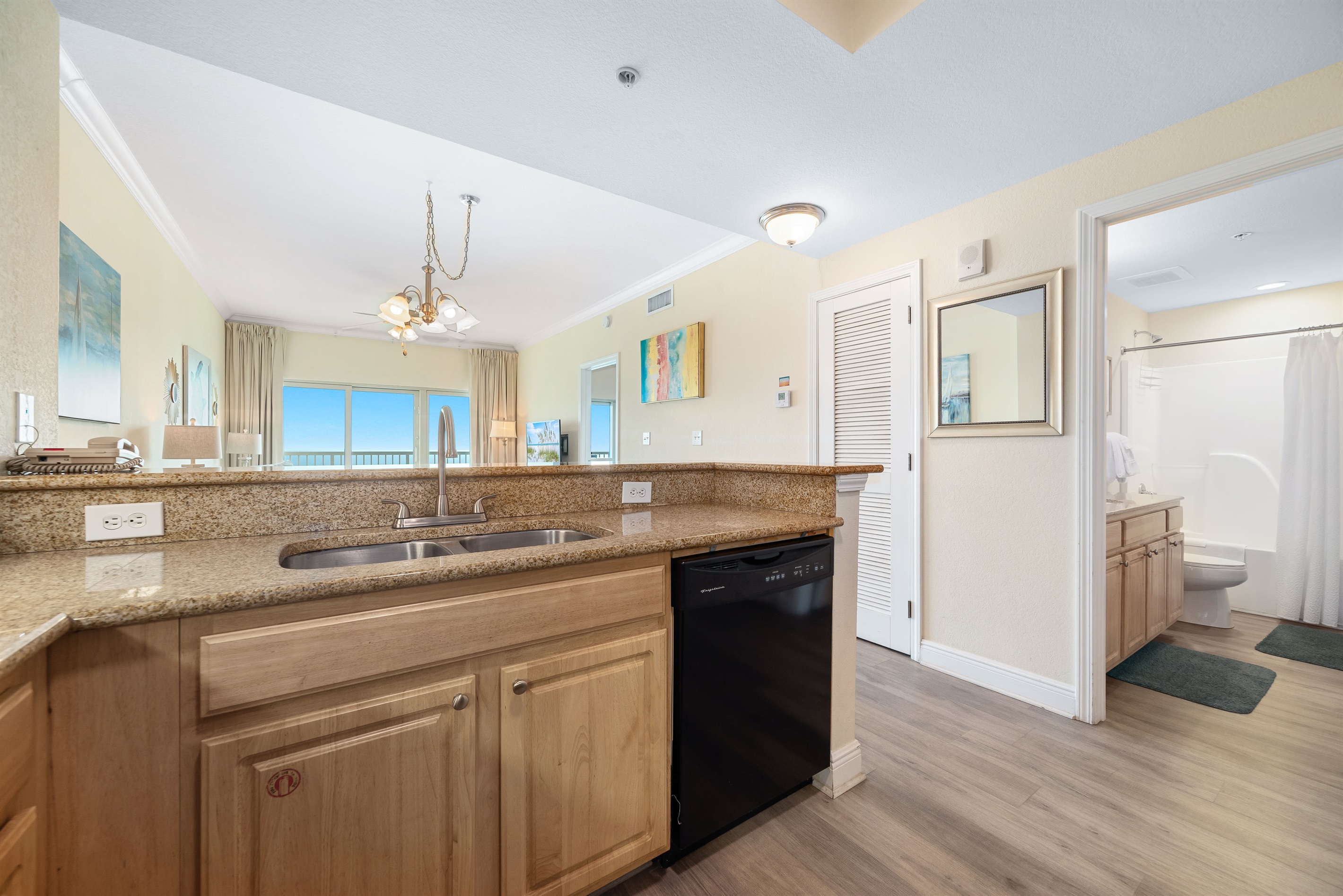 A well-equipped kitchen featuring modern appliances and stylish finishes, perfect for culinary enthusiasts.