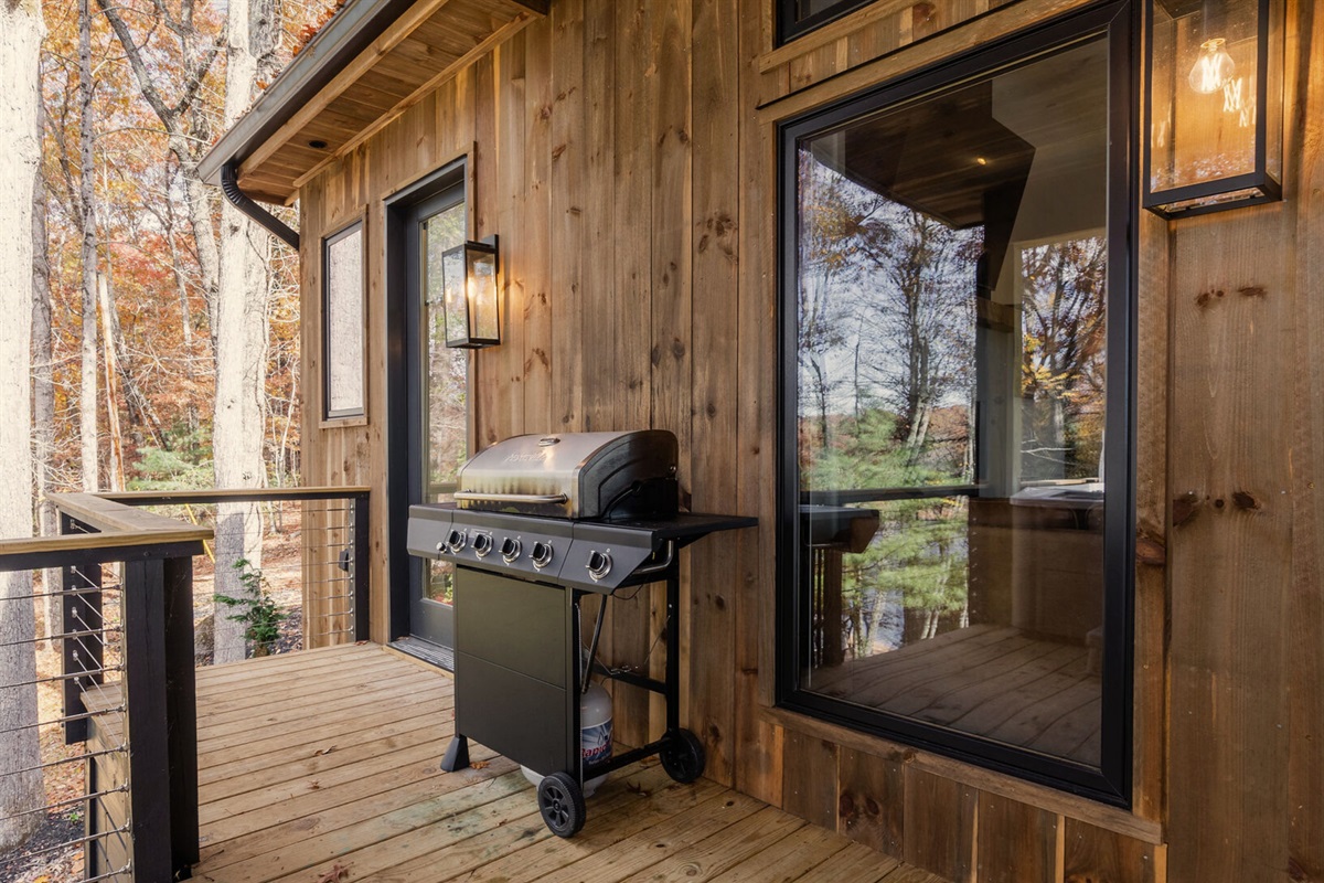 A well-equipped grill station on the deck, ready for outdoor cookouts and family feasts.