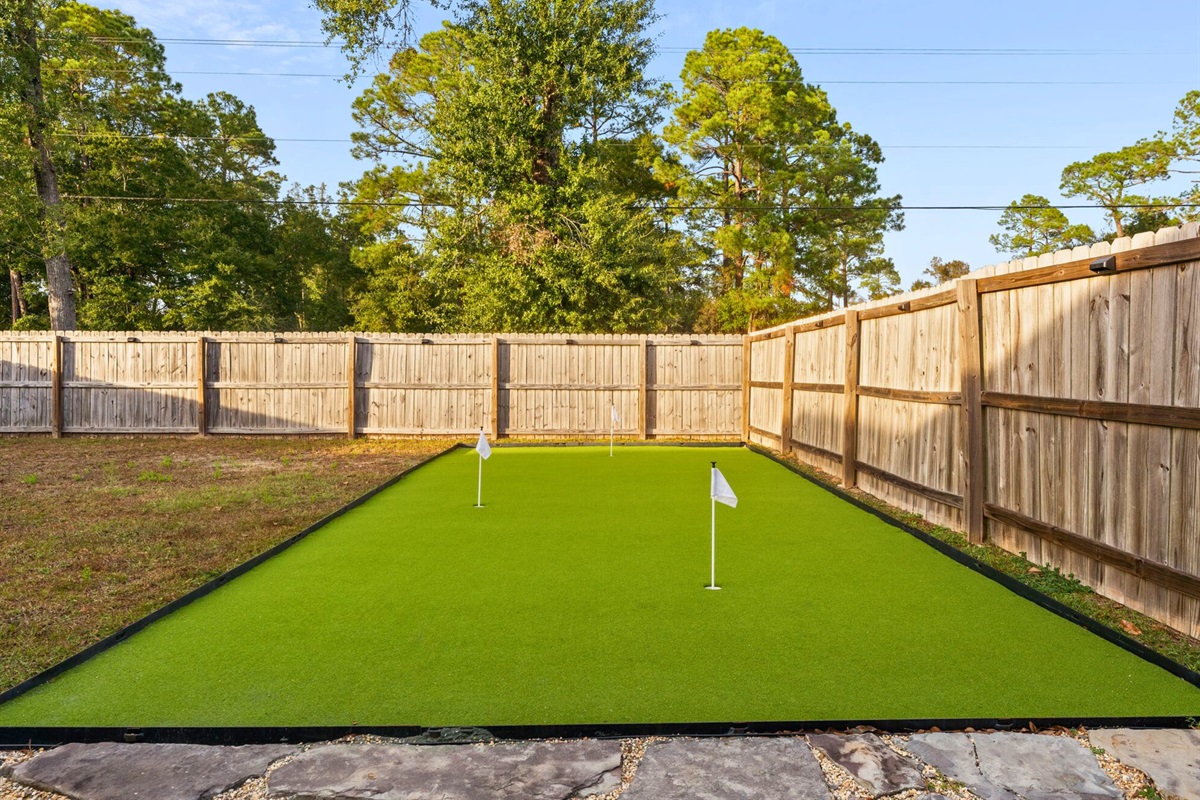The private putting green adds a fun, playful touch and is perfect for friendly competition without leaving the house.
