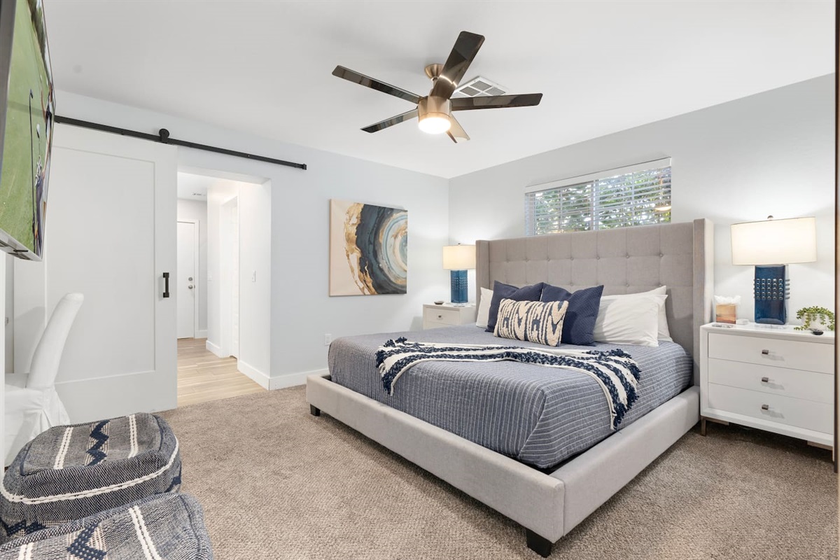 Spacious king bedroom, offering a luxurious and comfortable retreat with ample room to relax.
