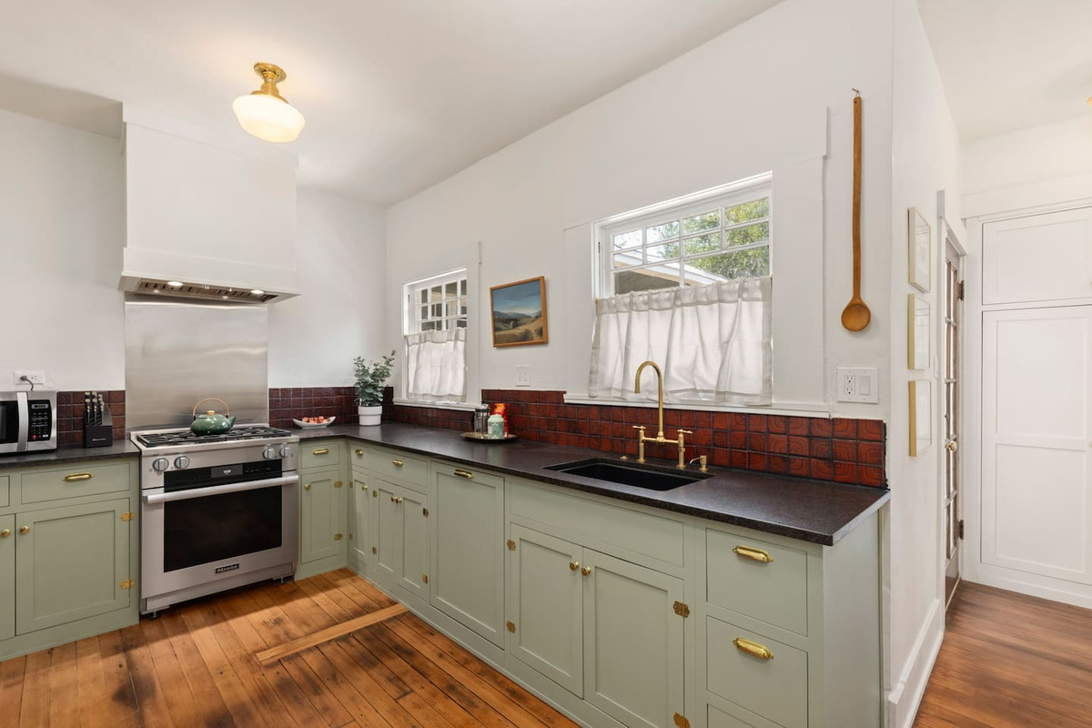 spacious fully-stocked kitchen