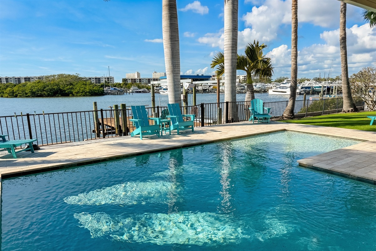 Heated pool with large sun deck for relaxing and vibing