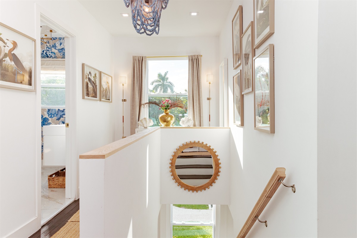 As you head upstairs, drawings of fowl local to the area bring the outdoors inside.