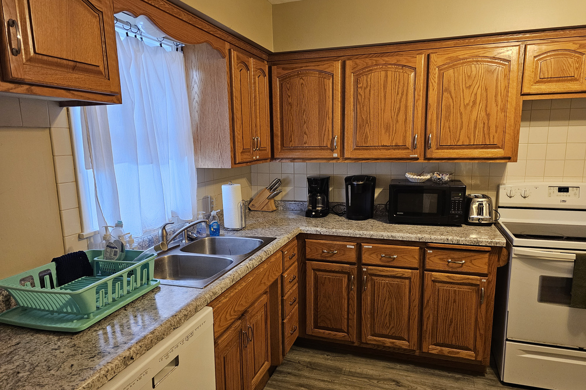 Full kitchen with stove, refrigerator, dish washer, microwave, coffee makers, pots/pans, and most other essentials.