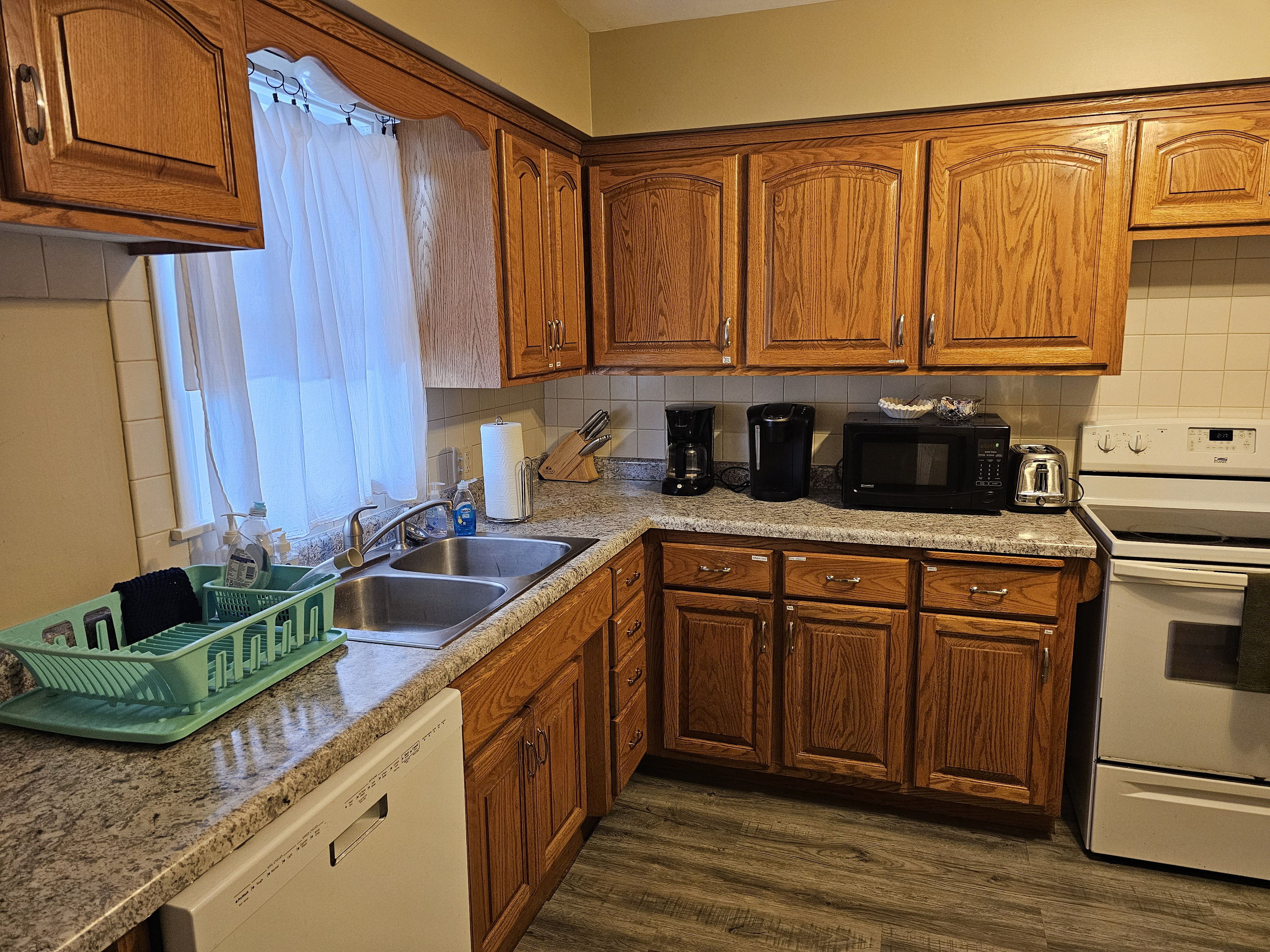 Full kitchen with stove, refrigerator, dish washer, microwave, coffee makers, pots/pans, and most other essentials.