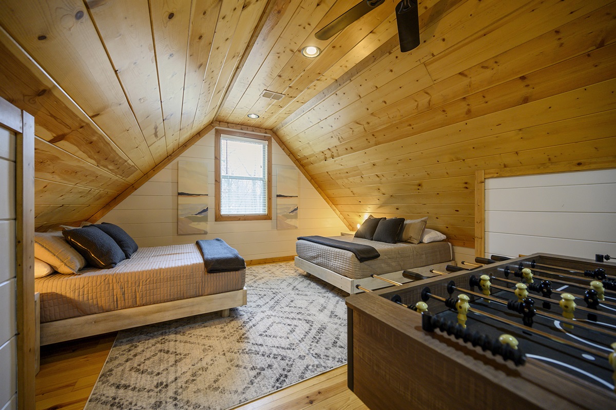 Sleep under the stars in our cozy attic bed – a charming hideaway for dreamers