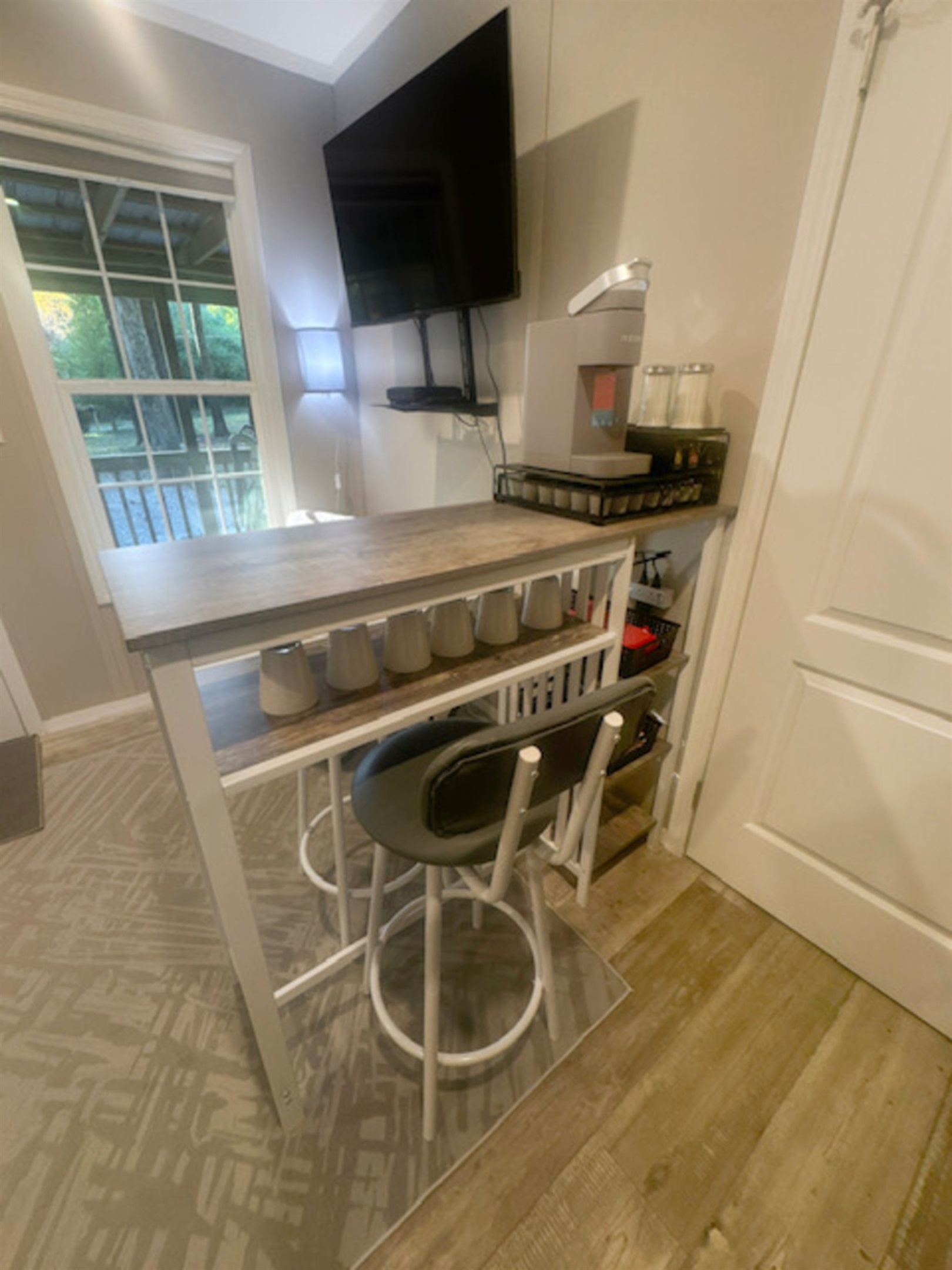 Dining table with 2 chairs and coffee bar