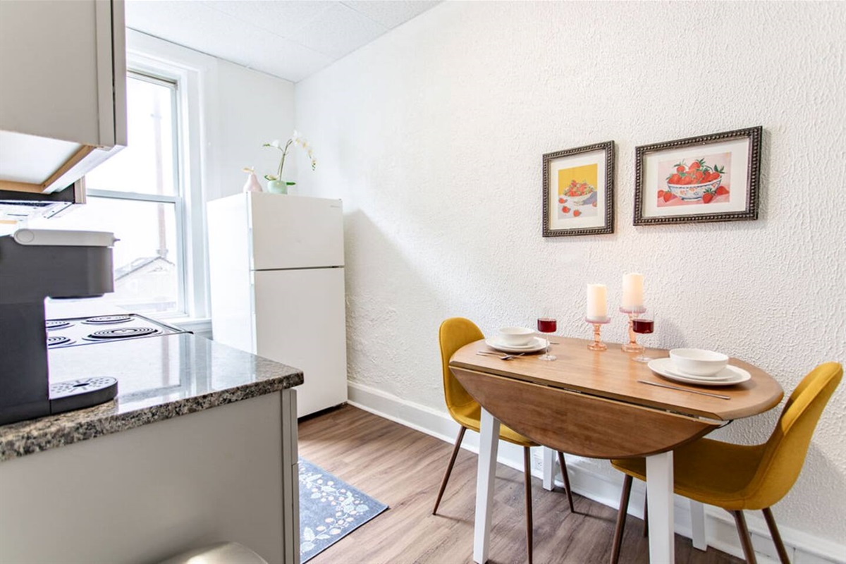 Cozy dining area for two, perfect for intimate meals or casual gatherings.



