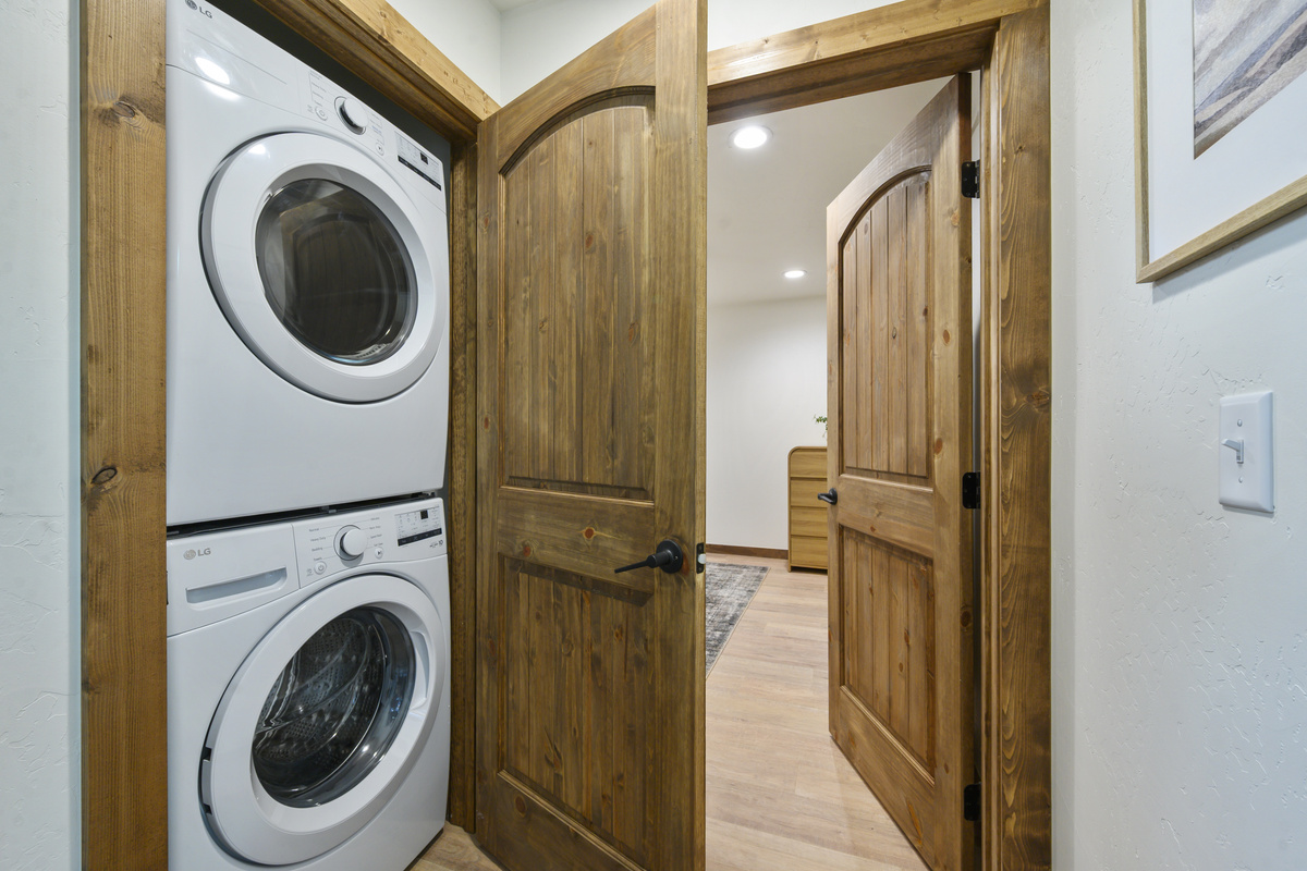 Full-size washer and dryer tucked conveniently near the bedrooms, making longer stays and family trips that much easier.
