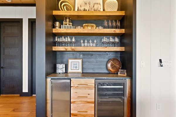 Every detail caters to comfort and style, from the well-stocked bar area to the elegant decor that complements your stay.