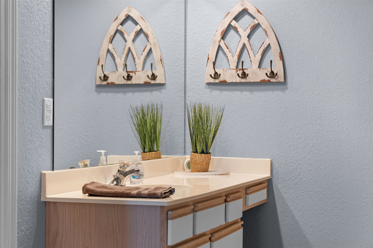 Clean, bright vanity space makes the bathroom feel functional and easy to use.