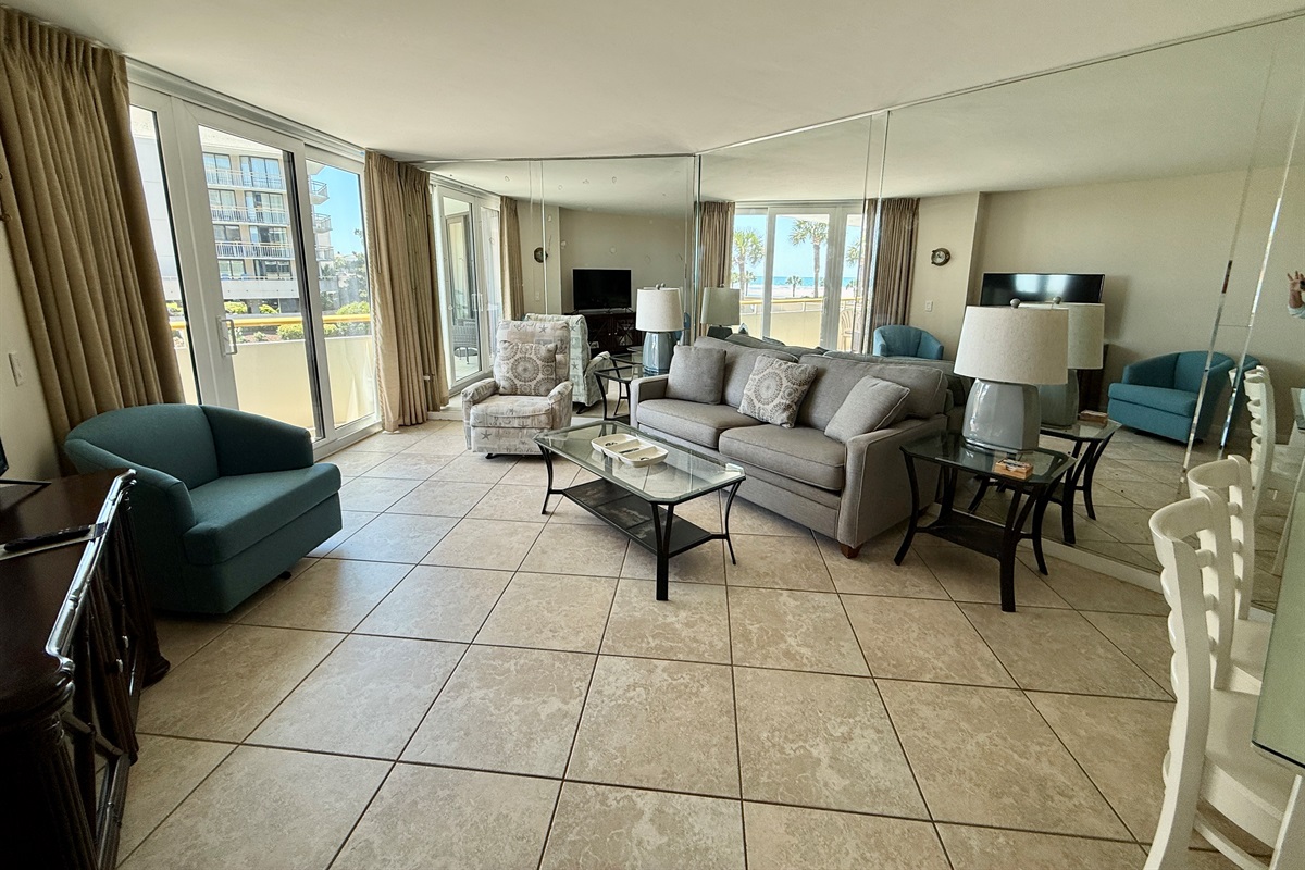 Tiled Living Room w/Glass Sliders to the Balcony