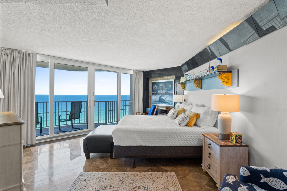 Master bedroom with king bed and beach views