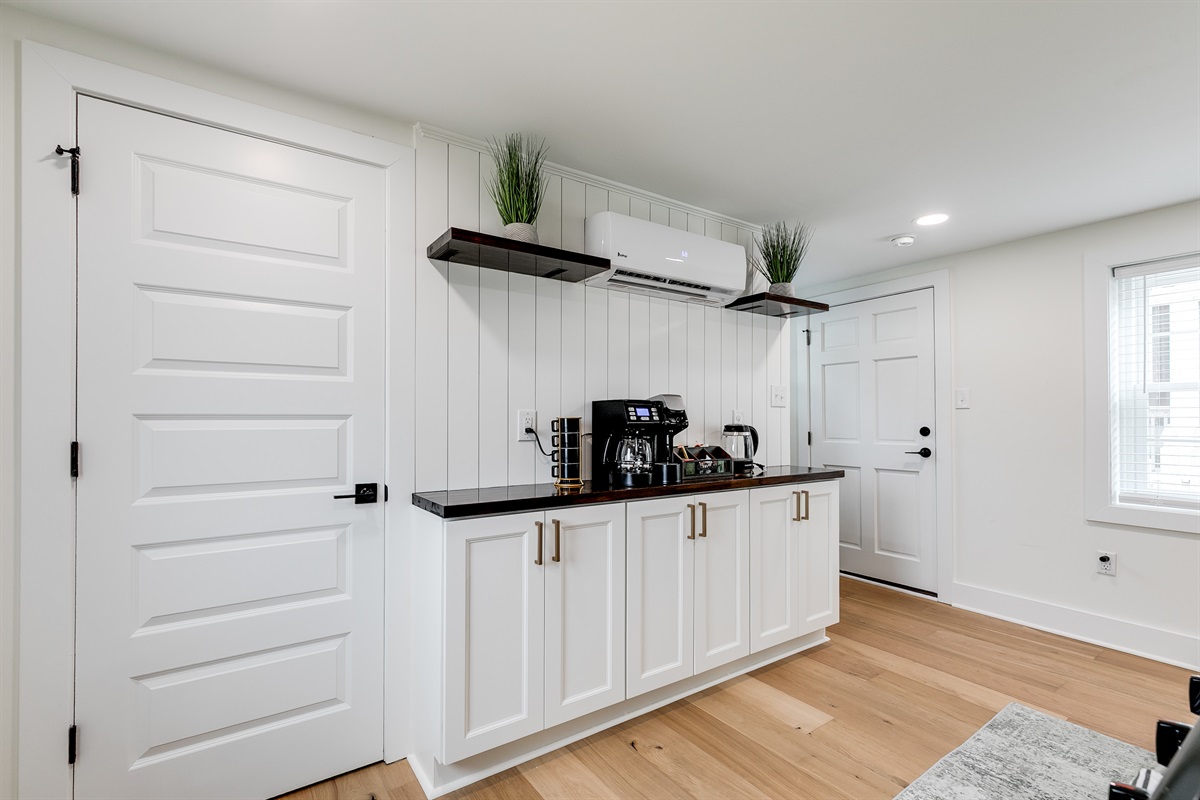 Kitchen: Modern prep space with sleek appliances and charming decor awaits your culinary flair!