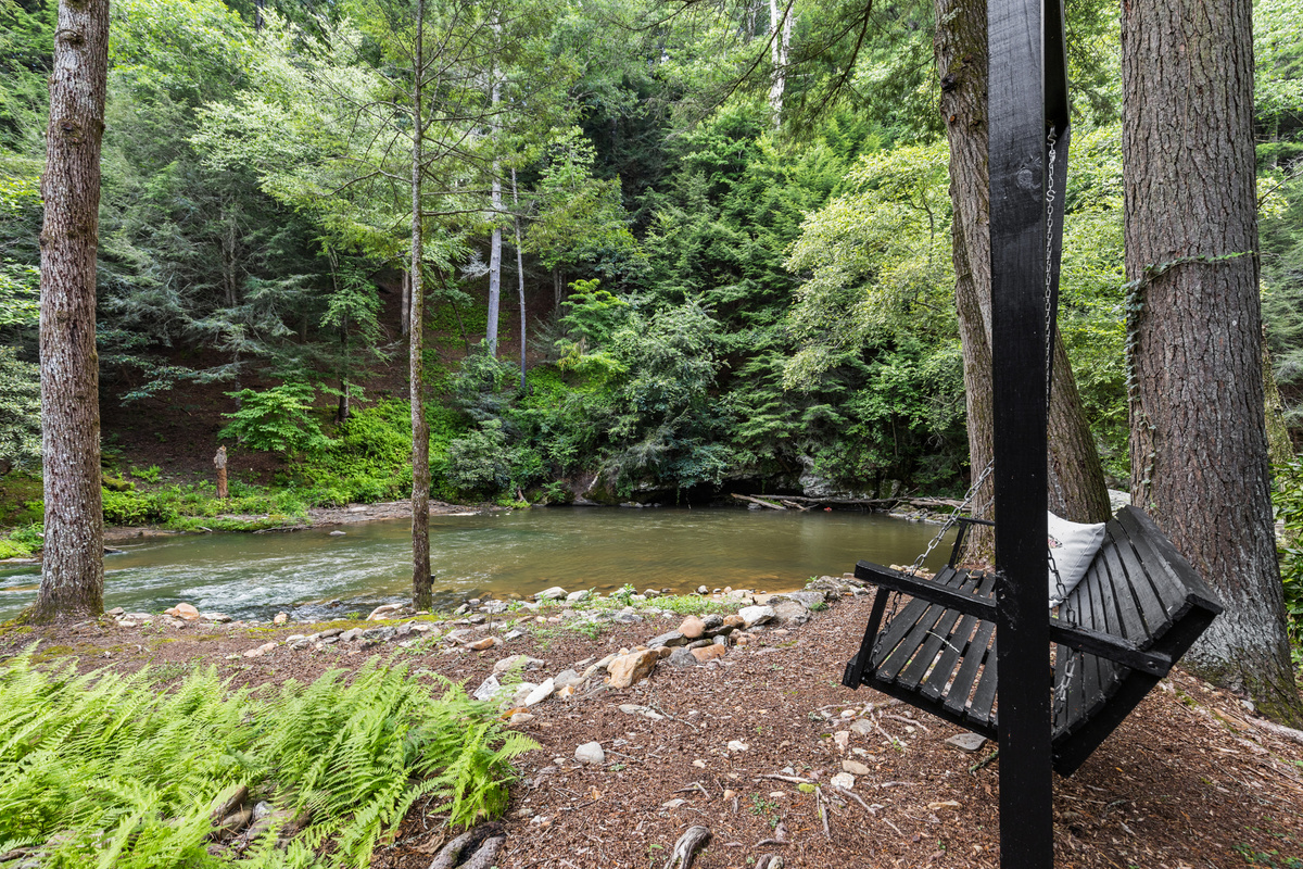 Start your morning with coffee or unwind at sunset on the riverside swing overlooking the water.