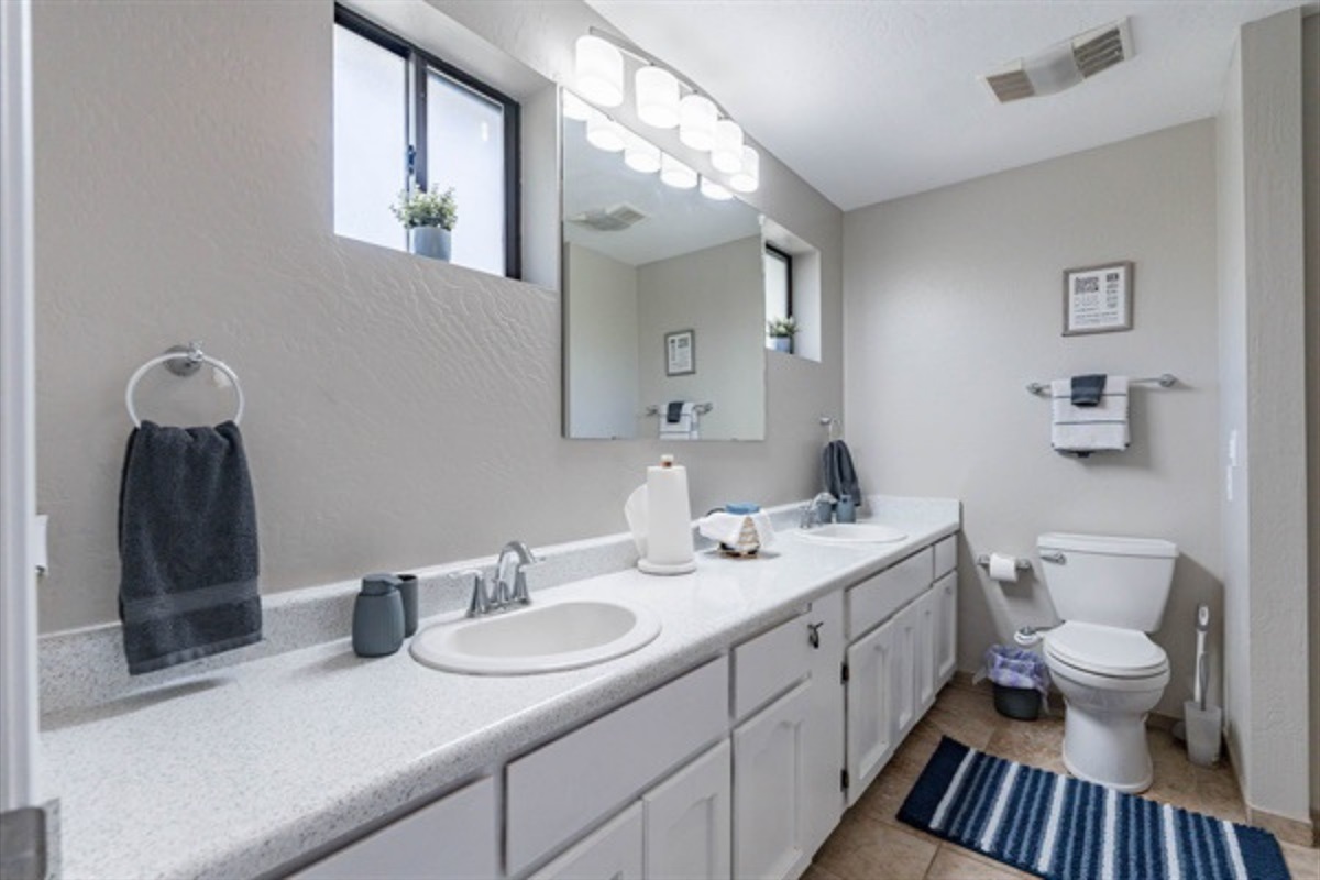 Lovely ensuite with convenient double sinks.