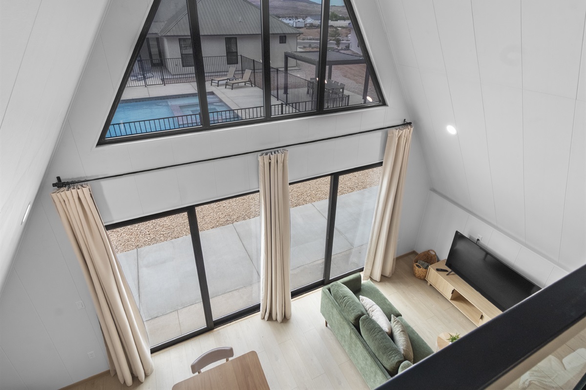 Main Room View of Pool and Pergola
