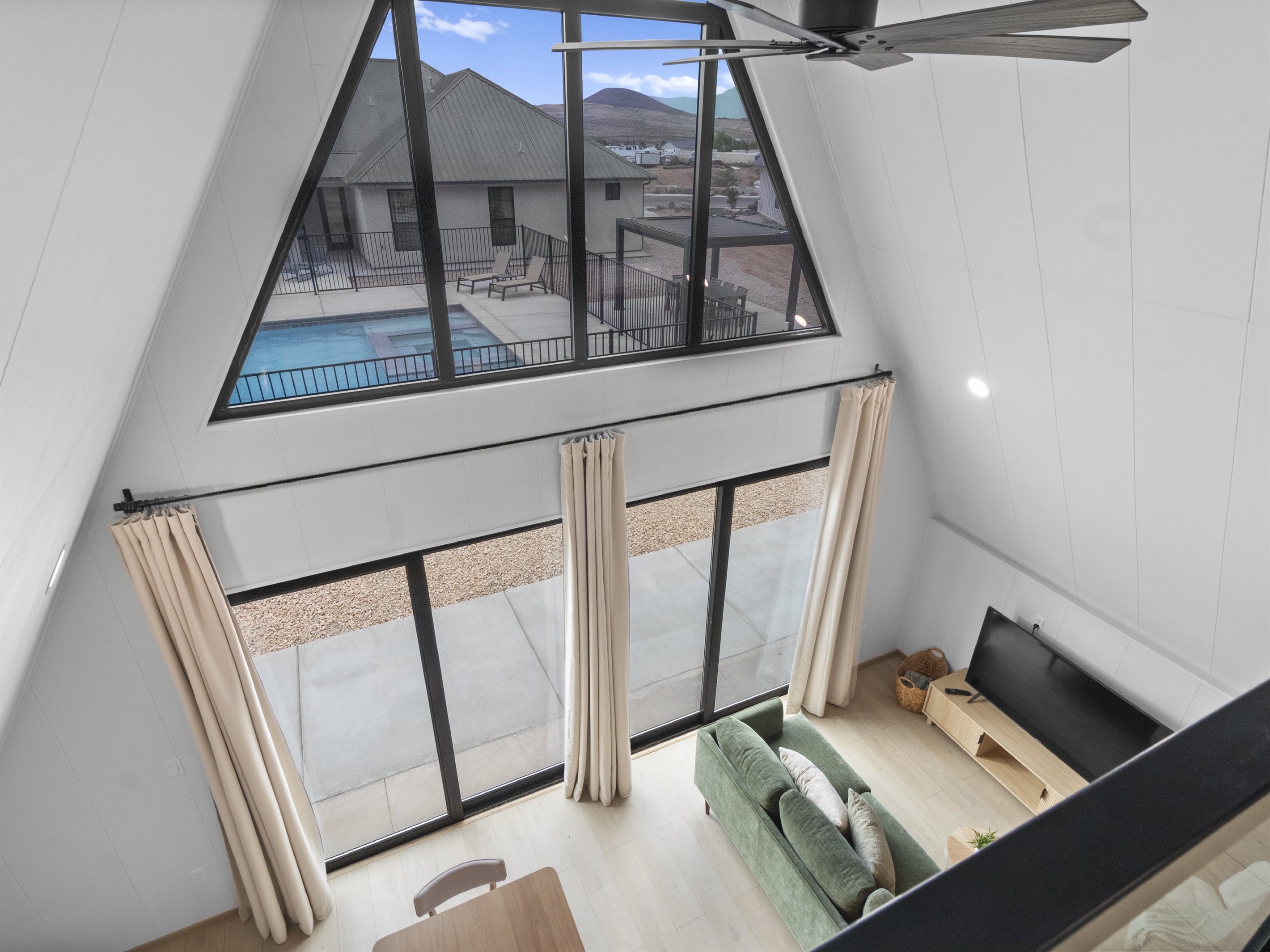 Main Room View of Pool and Pergola