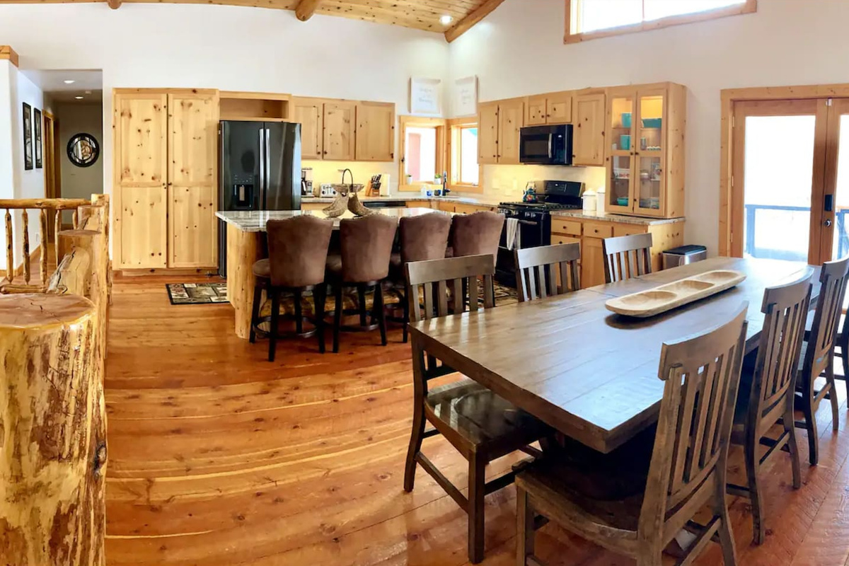 Fully equipped kitchen with everything you need. Hallway to bedrooms 2 and 3. Easy access from the garage to the main floor. Large patio and hot tub access right outside these doors.