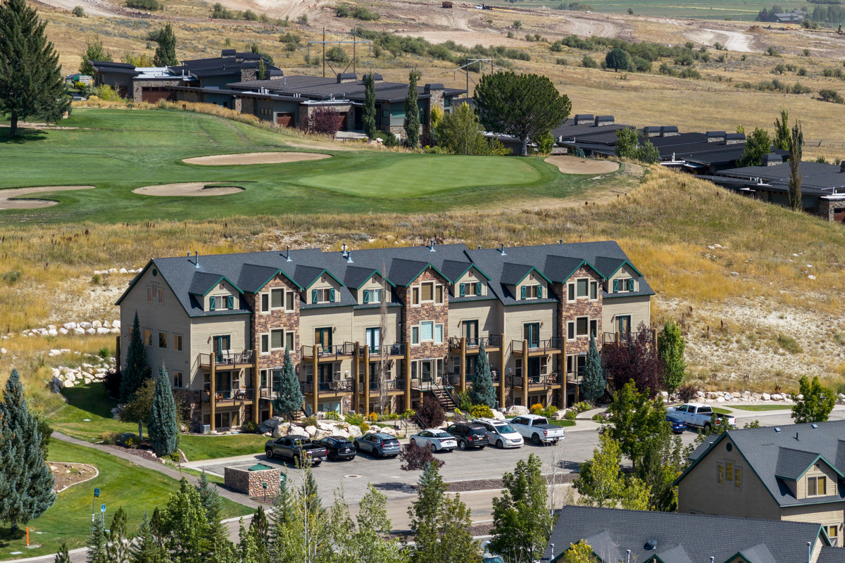 Aerial views highlight the home’s convenient location within the scenic Moose Hollow community.