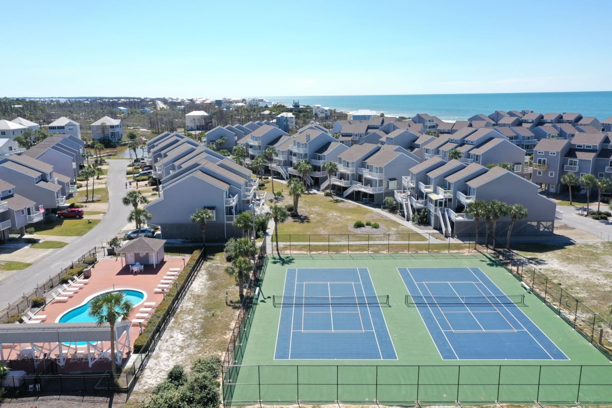 Hit the courts before breakfast &mdash; tennis and pickleball steps from your door, no reservation needed.