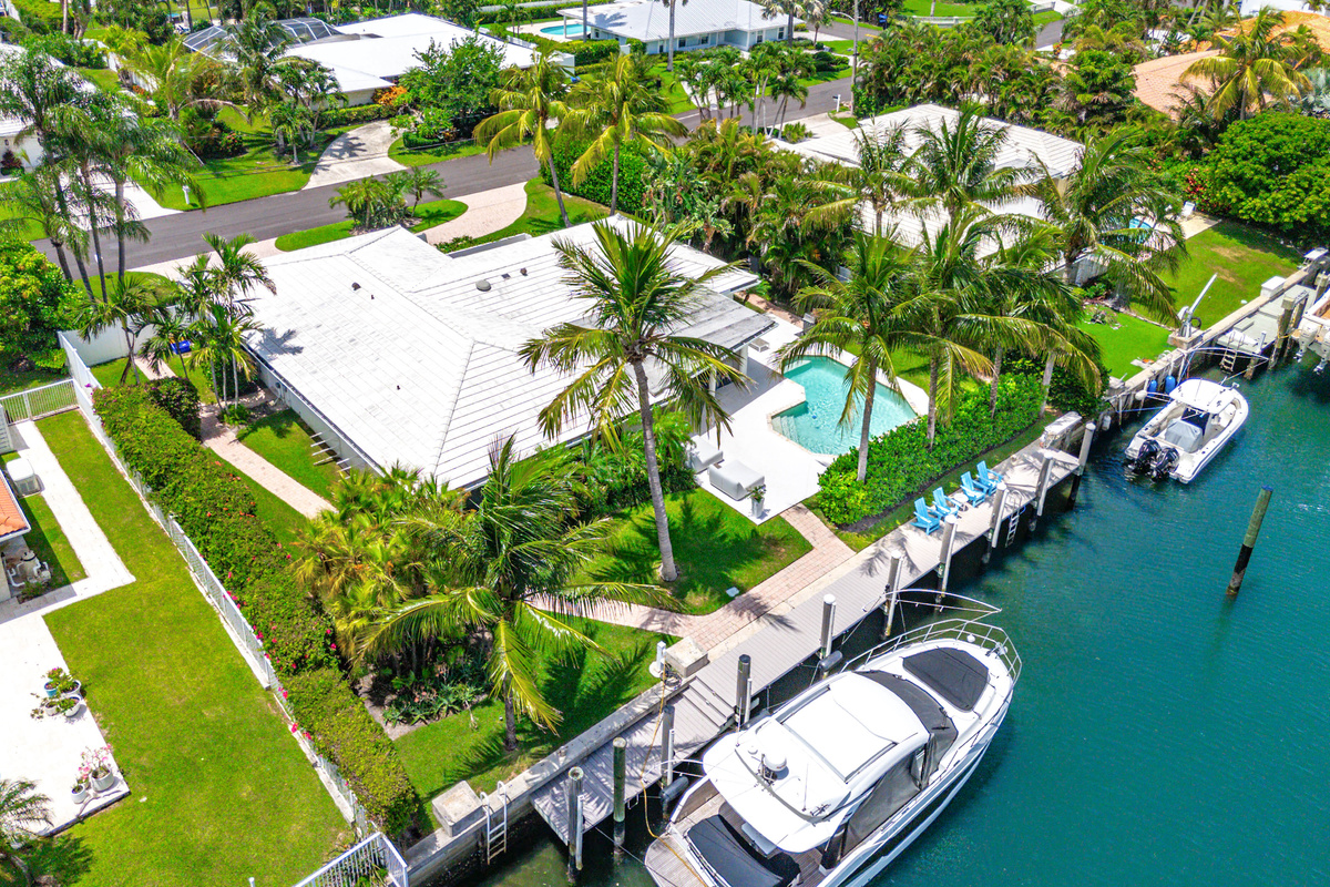 The boat shown is privately owned and not available for guest use. A separate portion of the dock is available for approved guest boats, subject to size restrictions and an additional fee.