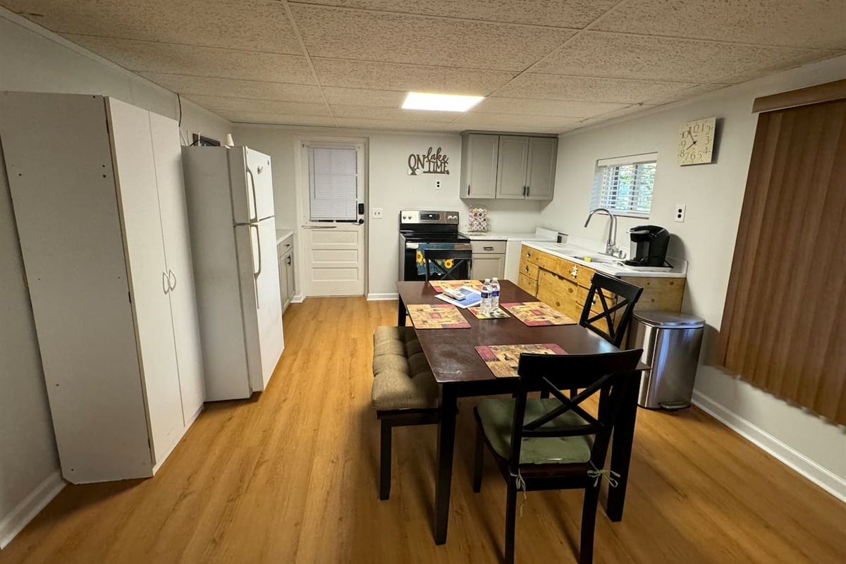 Full Kitchen / Dining Area. 

Coffee maker,  full fridge, plus plenty of storage space. 