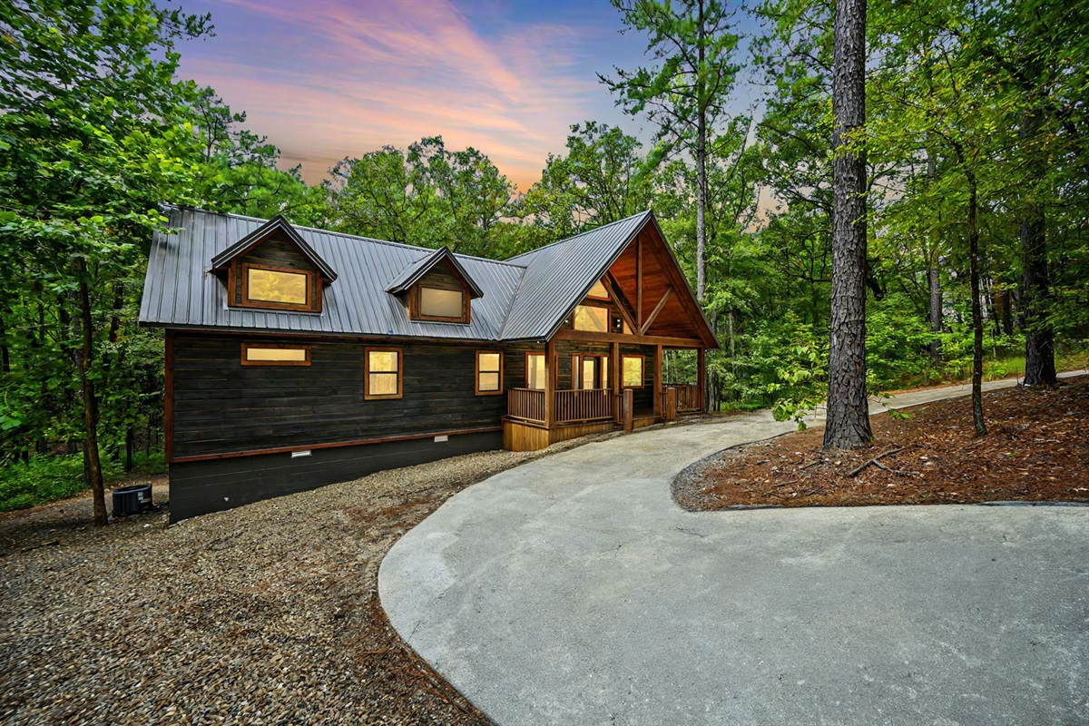 Property has a full paved circular driveway.