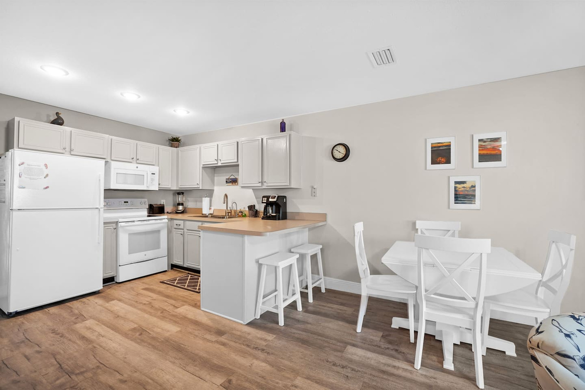 Gather at the kitchen table with the whole group &mdash; the open plan means no one's eating alone.