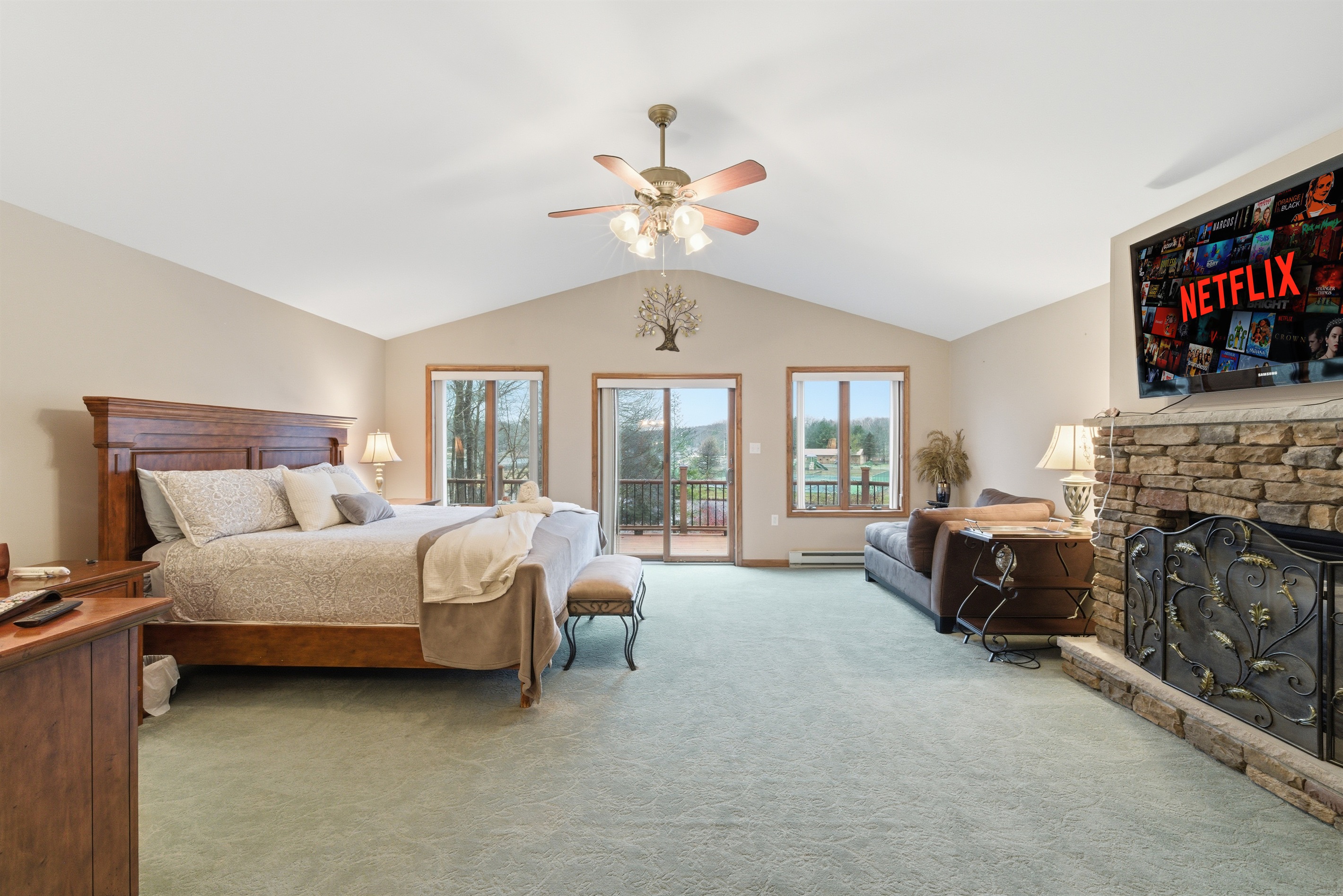 Master Bedroom with King size bed, fireplace, Roku TV and en-suite bathroom