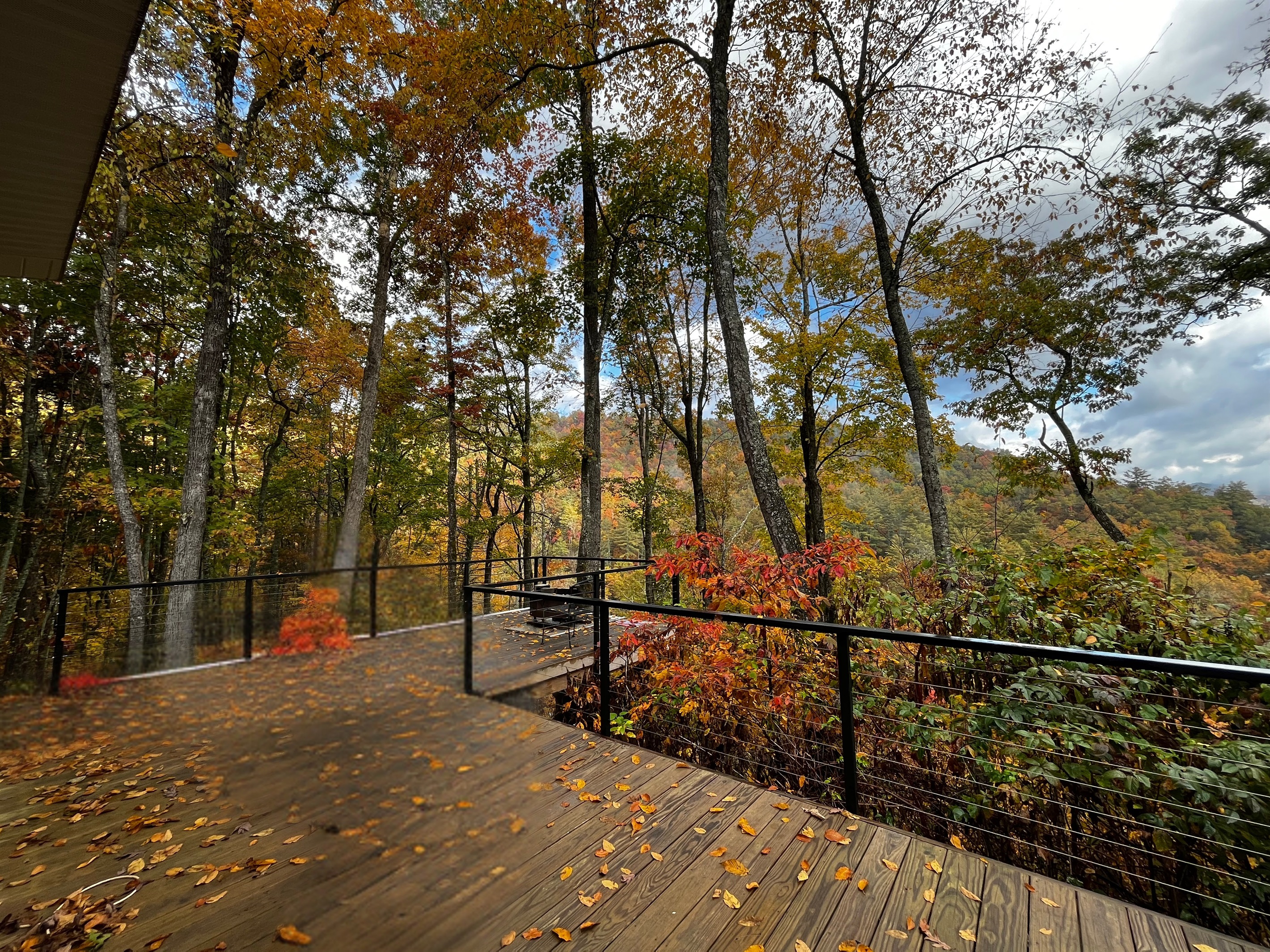 Fall at Wrigs Ridge is pure mountain magic- vibrant leaves, crisp air, and colorful views from the deck that make you want to stay a little longer.