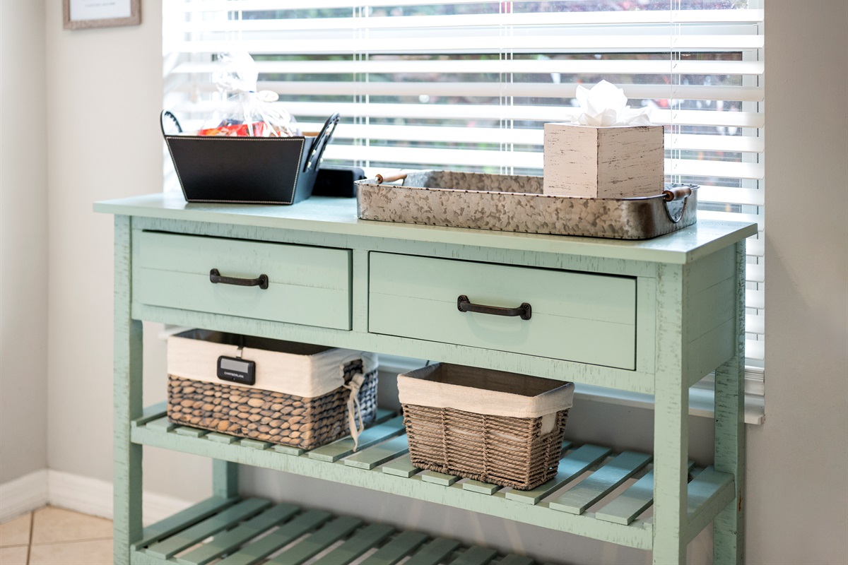 This cozy kitchen nook adds a pop of charm and a dash of beachy vibes