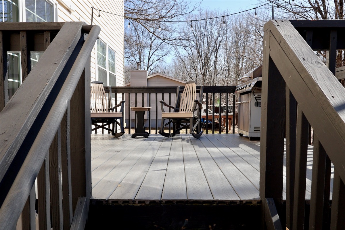 Rocking Chairs to sip coffee from as you greet a new day. Gas grill.