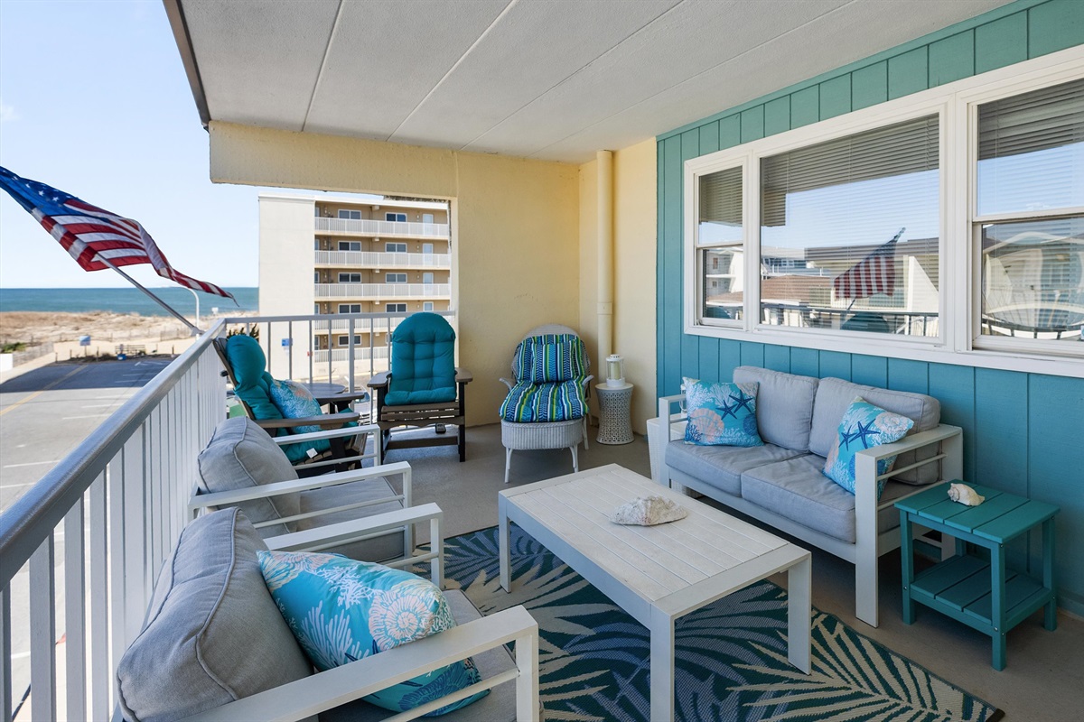 Enjoy cool breezes and ocean view from the corner balcony