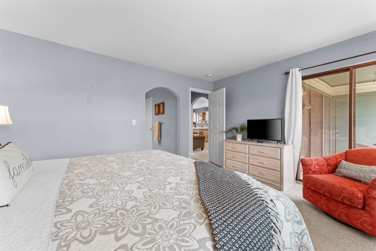 The primary suite includes extra seating and added flexibility for sleeping arrangements.