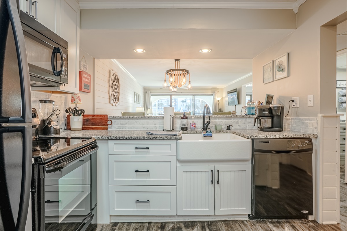 Updated and upgraded kitchen overlooking dining/living areas