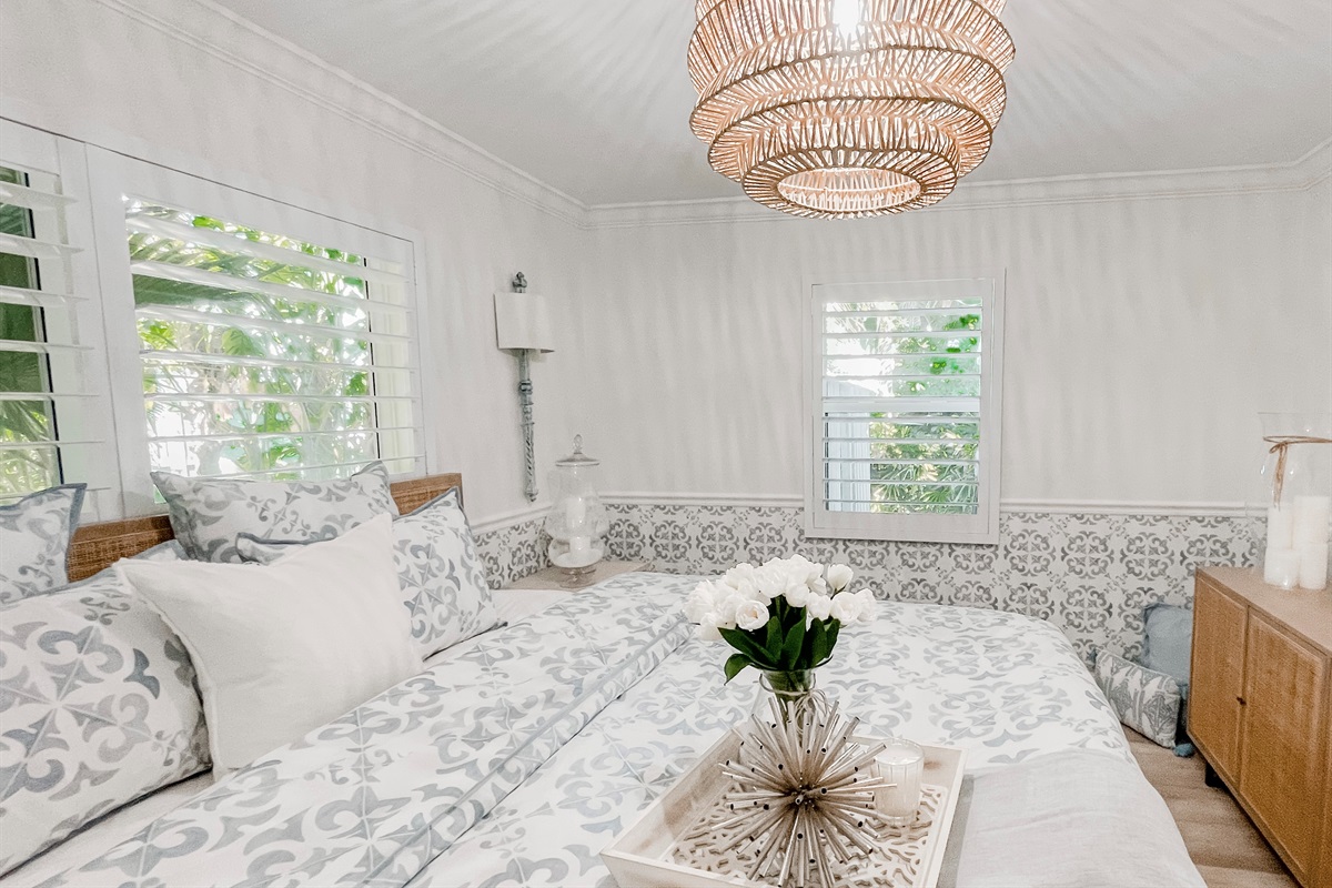 Light tones and soft linens welcome you home.