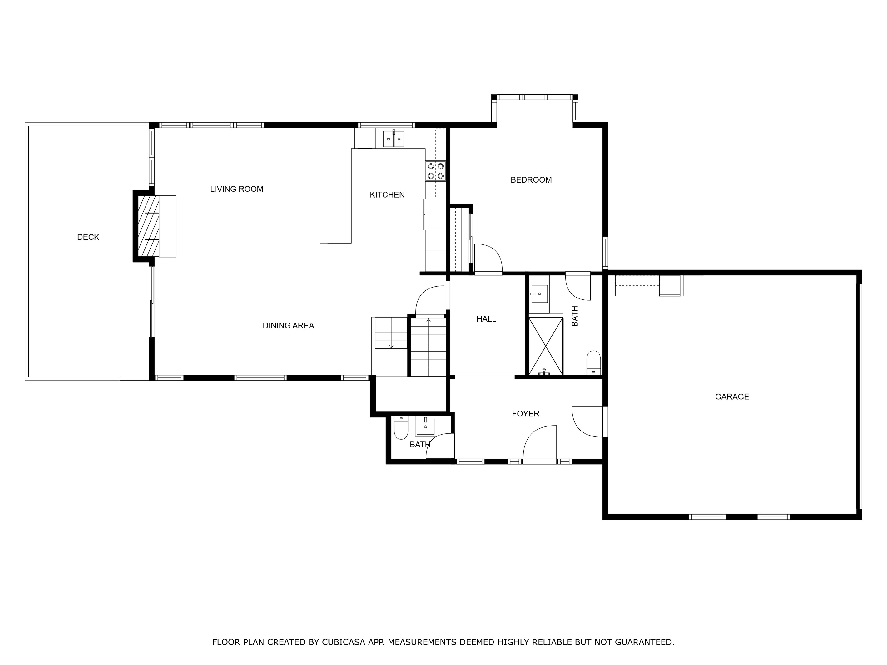 Main level floor plan with living room, kitchen, dining area, bedroom and deck