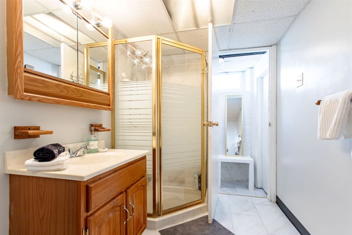 Bathroom with a walk-in shower. 
