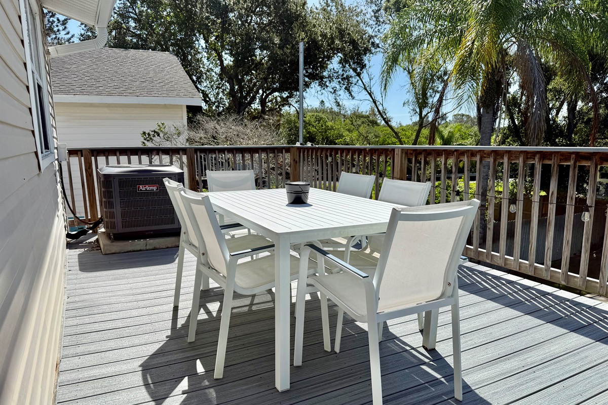 Sit back, sip a cool drink, and enjoy good company in this inviting open-air setting.
