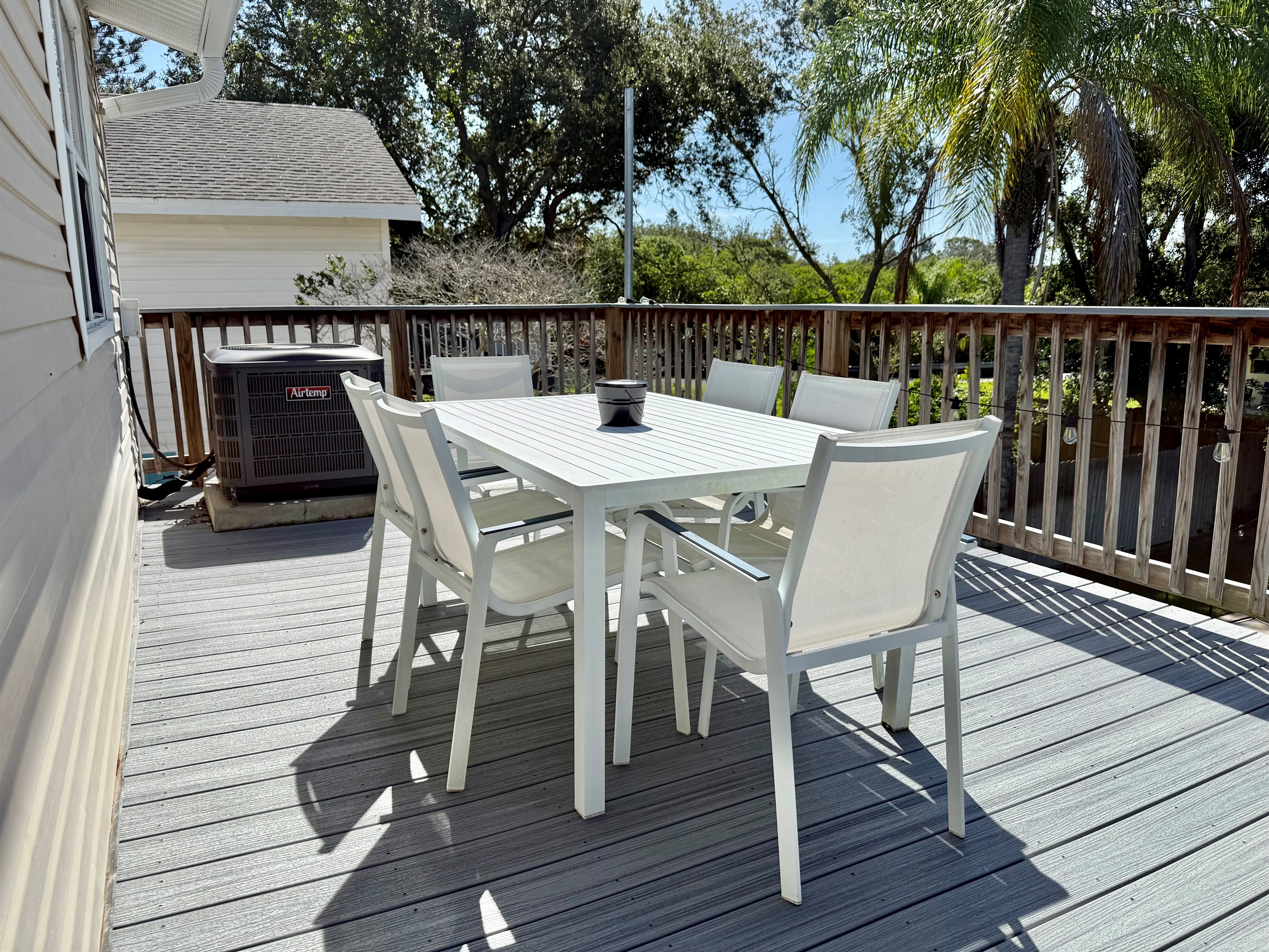 Sit back, sip a cool drink, and enjoy good company in this inviting open-air setting.