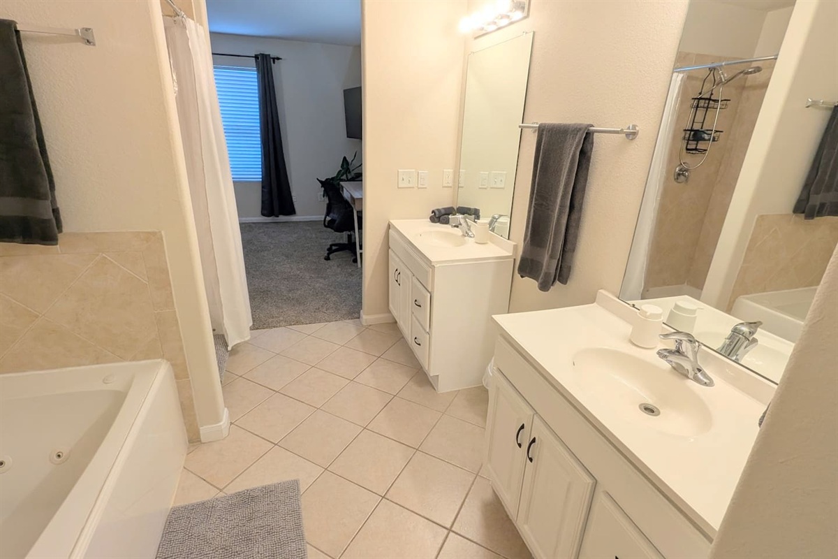 Enjoy the relaxing and spacious primary bathroom. 