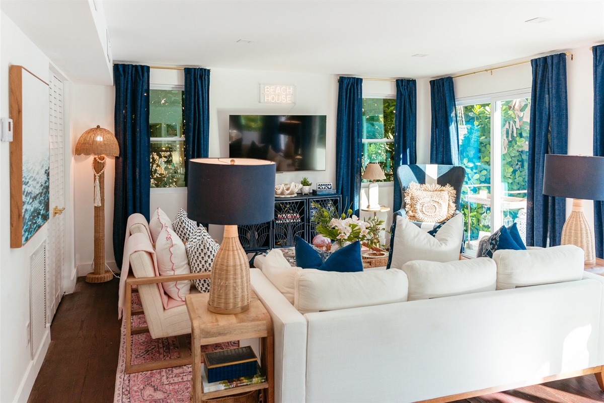 Adjacent to the bar and dining area is the living room, where you can unwind on our comfortable seating.