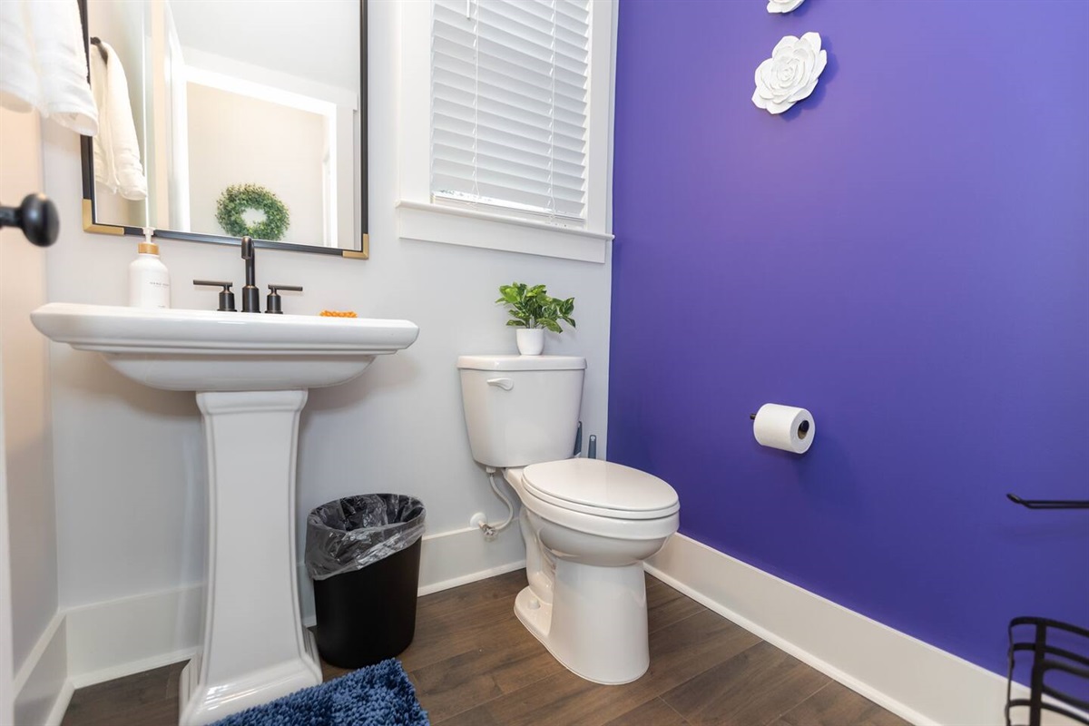 A half bath located off the kitchen on the main floor is convenient for your group and makes for 4.5 bathrooms.